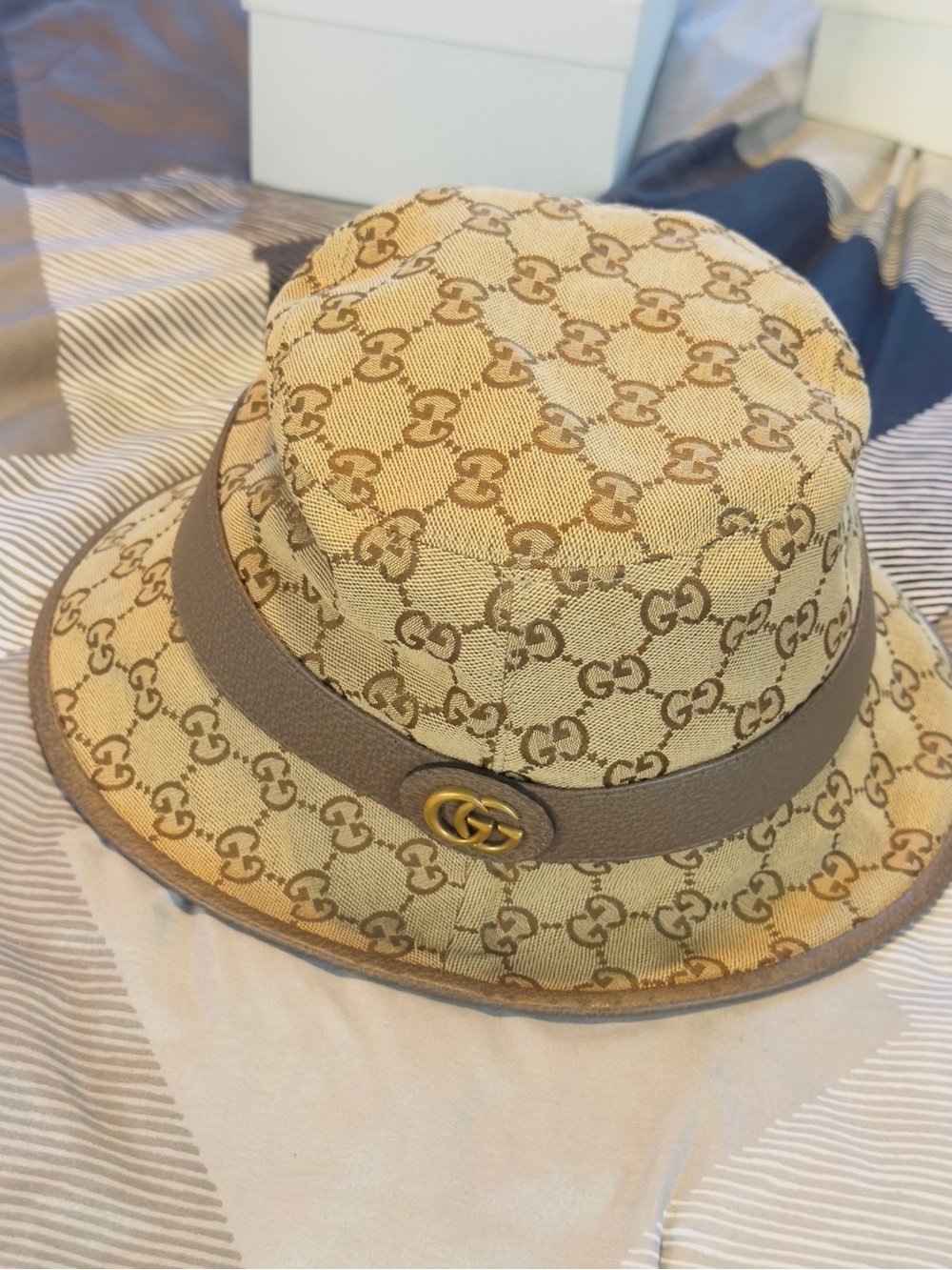 Gucci Beige GG Monogram Bucket Hat with Taupe Band and Gold Logo